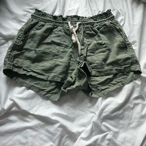 green shorts
